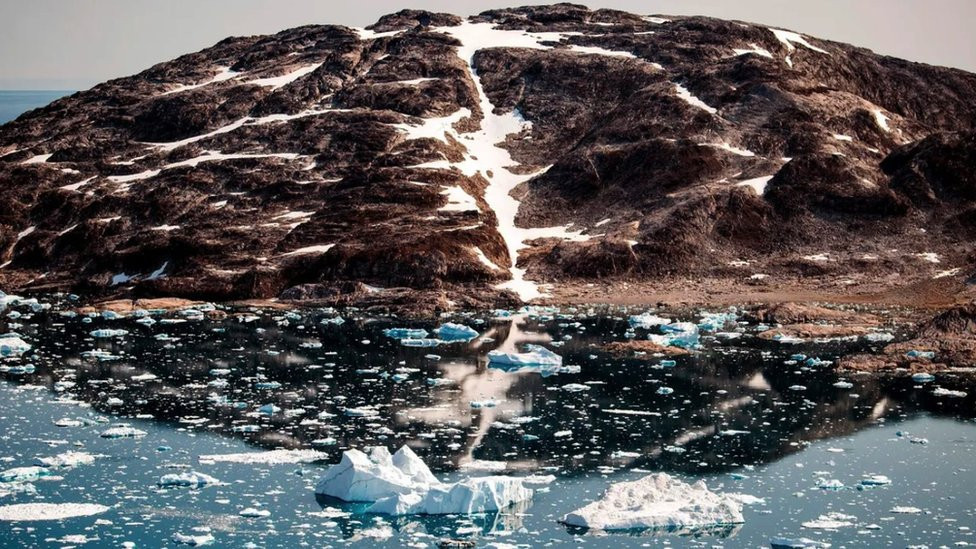 A glacier releasing water