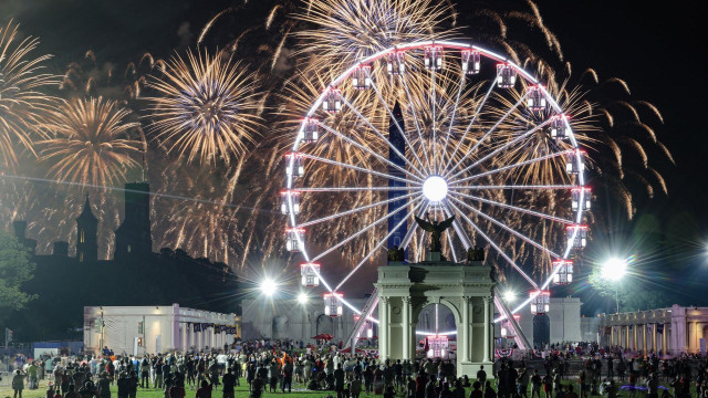 People watch a fireworks display at a Fourth of July rally featuring US President Donald Trump at the National Mall in Washington